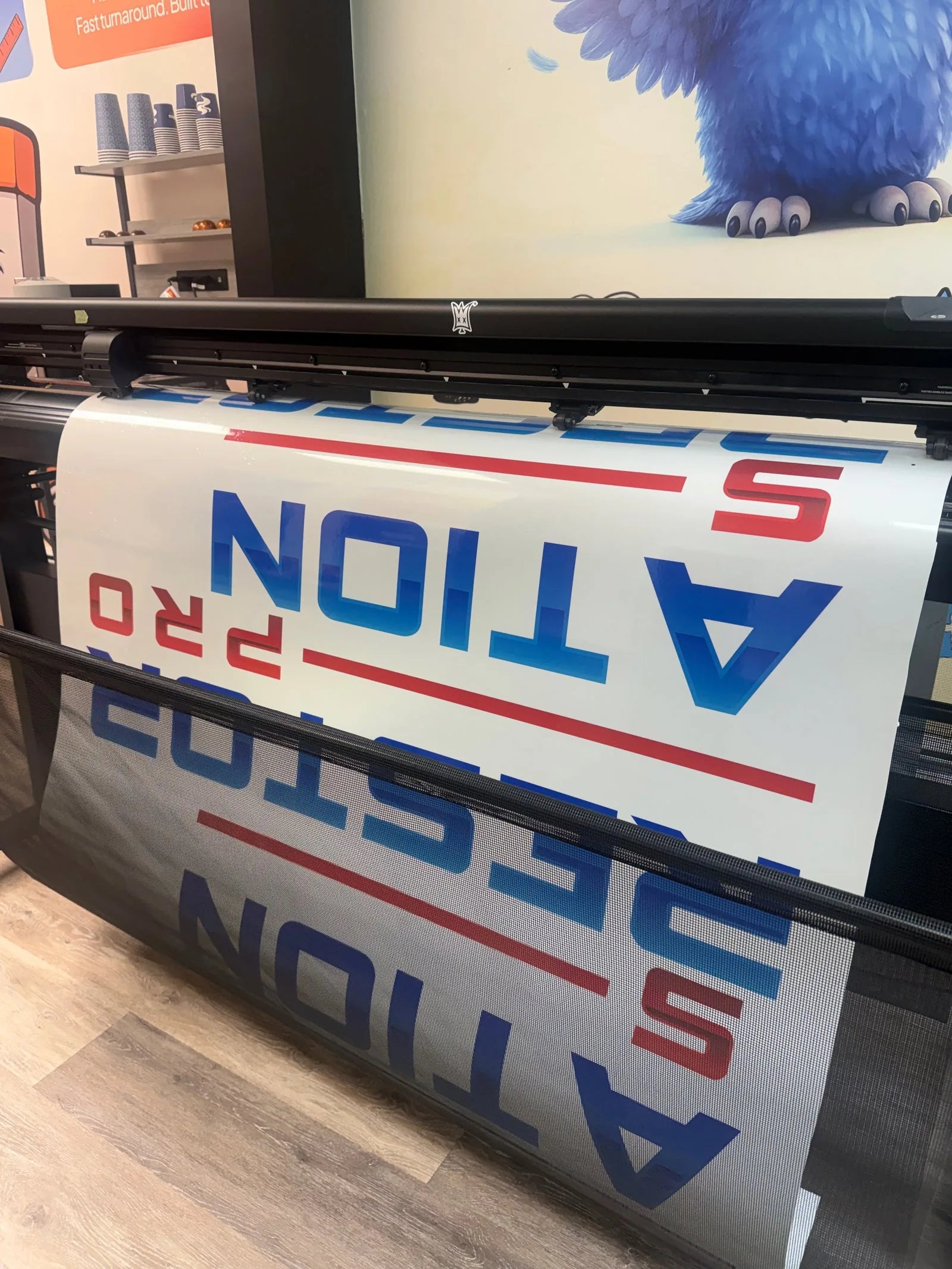 Printed panels coming off the cutter